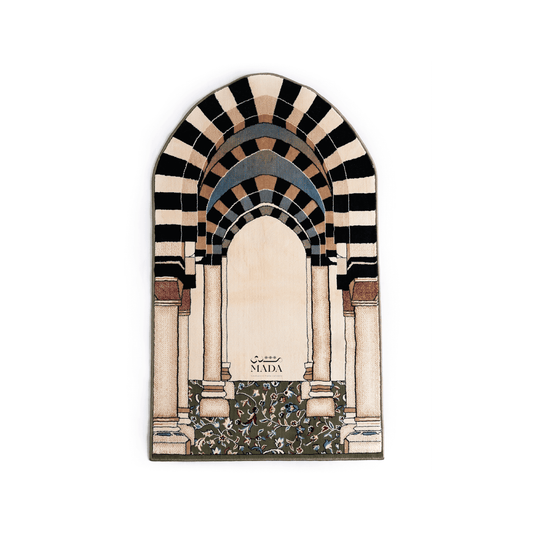 Islamic prayer rug inspired by Madinah arches featuring layered arch design with striped detailing and column motifs
