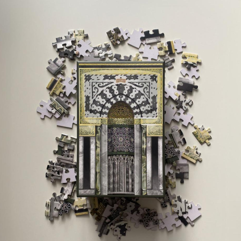 Islamic jigsaw puzzle featuring the mihrab of the Prophet’s Mosque with intricate architectural details
