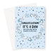 Islamic baby boy congratulations greeting card featuring the message “Congratulations It’s a Boy” with a duʿāʾ asking Allah to make him the coolness of his parents’ eyes, illustrated with soft blue baby-themed icons, designed by Ilhaam.
