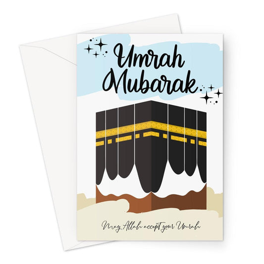 Islamic Umrah Mubarak greeting card featuring an illustration of the Kaaba with hanging kiswa detail and star accents, designed by Ilhaam