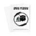 Islamic Umrah greeting card featuring a circular black wreath design with illustrations of the Kaaba and Masjid an-Nabawi, with the message “Umrah Mubarak”, designed by Ilhaam